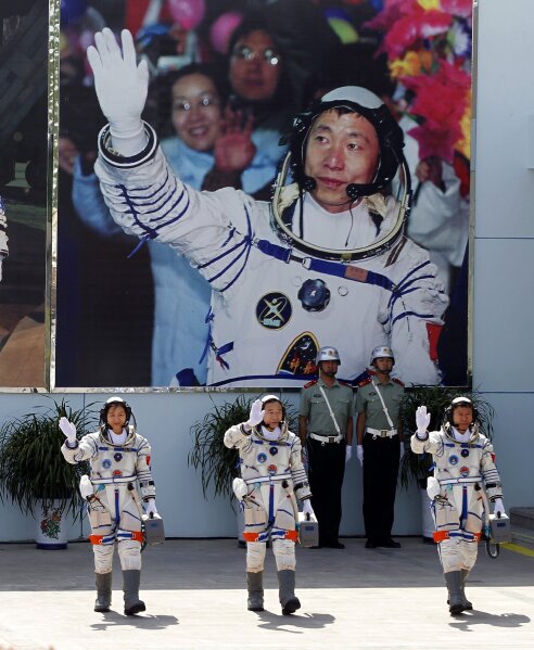 China's space ambitions: Robot on Mars, a human on the moon | AP News